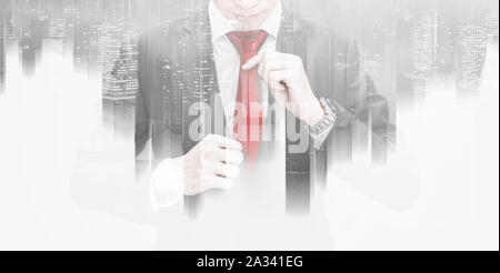 Double exposure, Business leader holding red necktie Stock Photo