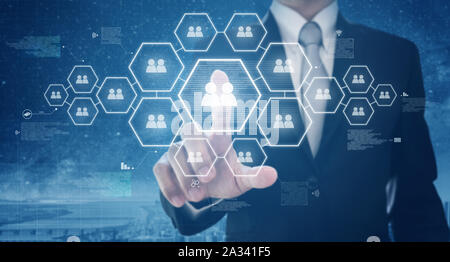 Business human resource and social networking. Businessman pushing human icon on screen Stock Photo