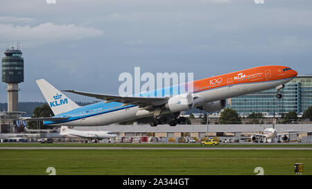 Richmond, British Columbia, Canada. 3rd Oct, 2019. A KLM Royal Dutch Airlines Boeing 777-300ER (PH-BVA) wide-body jet airliner, painted in special ''Orange Pride'' livery and displaying a 100 Anniversity decal, takes off from Vancouver International Airport. Credit: Bayne Stanley/ZUMA Wire/Alamy Live News Stock Photo