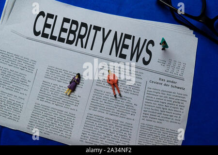 Celebrity News text in headline isolated on blue background. Newspaper concept Stock Photo