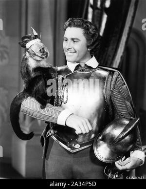 ERROL FLYNN as Captain Geoffrey Thorpe with his pet monkey in THE SEA HAWK 1940 director MICHAEL CURTIZ music Erich Wolfgang Korngold Warner Bros. Stock Photo