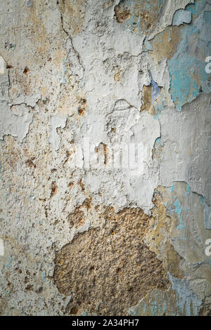 cracked and peeling paint and grunge old wall with texture Stock Photo