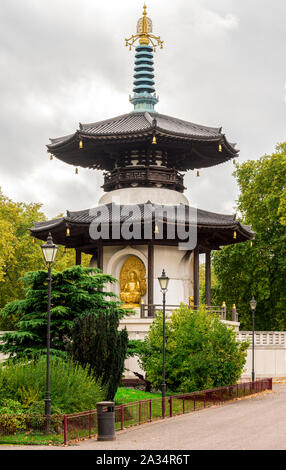 Spiritual and scenic London Peace Pagoda in Battersea Park on south side of Thames river, London, United Kingdom Stock Photo