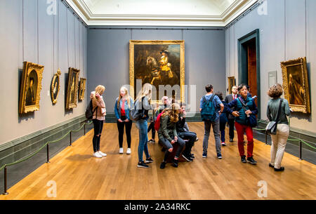 Tourists visit one of the rooms in National Portrait Gallery, London, United Kingdom Stock Photo