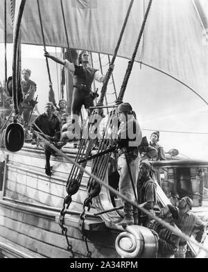 ERROL FLYNN as Captain Geoffrey Thorpe with crew of The Albatross in THE SEA HAWK 1940 director MICHAEL CURTIZ music Erich Wolfgang Korngold Warner Bros. Stock Photo