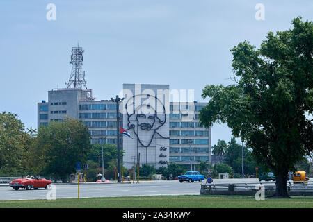 Buildings are adorned with monuments to Che Guevara and Fidel Castro in Place de la Revolucion, Havana, Cuba Stock Photo