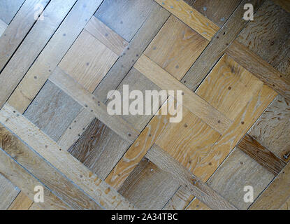 Very old wooden parquet floor with square pattern Stock Photo