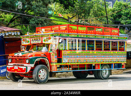 Andes, COLOMBIA - 27th March 2019. Colorful traditional rural bus in Colombia called chiva Stock Photo