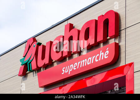 France Lyon 2019-06-18 Auchan supermarket logo. Auchan is a French international retail group and It is one of the world's principal distribution grou Stock Photo