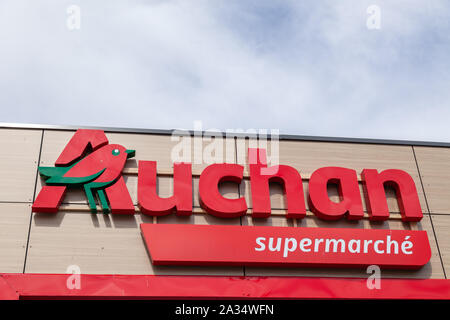 France Lyon 2019-06-18 Auchan supermarket logo. Auchan is a French international retail group and It is one of the world's principal distribution grou Stock Photo