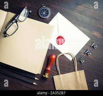 Vintage stationery template on wooden background. Responsive design mock up. Flat lay. Stock Photo