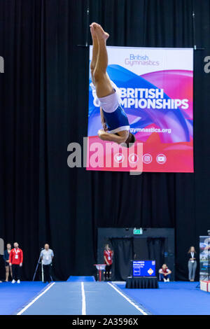 Birmingham, England, UK. 28 September 2019. Benjamin Goodall (OLGA Poole) in action during the Trampoline, Tumbling and DMT British Championship Qualifiers at the Arena Birmingham, Birmingham, UK. Stock Photo