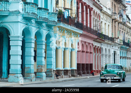 Colourful colonial buildings and classic cars are distinctive characteristics of Havana, Cuba Stock Photo