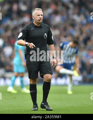 Brighton UK 5th October - Referee Jonathan Moss during the Premier League match between  Brighton and Hove Albion and Tottenham Hotspur at the Amex Stadium - Editorial use only. No merchandising. For Football images FA and Premier League restrictions apply inc. no internet/mobile usage without FAPL license - for details contact Football Dataco  : Credit Simon Dack TPI / Alamy Live News Stock Photo