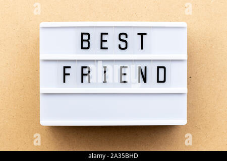 Light box with word best friend on wood background Stock Photo