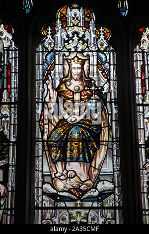 A stained glass window depicting Christ in majesty, Church of St Lawrence, Barton on the Heath, Warwickshire Stock Photo
