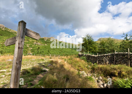 Signpost to Helvelyn, The Lake District, Cumbria in the UK. Stock Photo