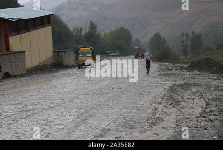 Baghlan. 4th Oct, 2019. Photo taken on Oct.4, 2019 shows vehicles running on a battered road at the Salang Pass in Baghlan province, Afghanistan. TO GO WITH 'Feature: Afghanistan's vital Salang Pass Tunnel in dire need of restoration' Credit: Sahel/Xinhua/Alamy Live News Stock Photo