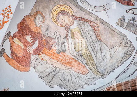 the birth of Jesus in Bethlehem, a wall-painting from about the year 1500 in the church of St. Mary, Elsinore, Denmark, May 14, 2019 Stock Photo