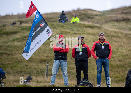 Llanidloes, UK. 5th Oct, 2019. 3 fans supporting Toyota during Stage fifteen of the Wales Rally GB, Credit: Jason Richardson/Alamy Live News Stock Photo