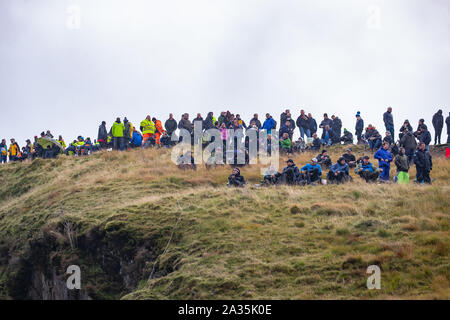 Llanidloes, UK. 5th Oct, 2019. large crowds of people brave the wether during Stage fifteen of the Wales Rally GB, Credit: Jason Richardson/Alamy Live News Stock Photo