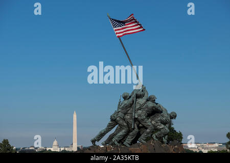 Iwo Jima Statue or US Marine Corps Memorial backed by the US Capitol Buiding and Washington Monument, Arlington Ridge Park, Washington DC, USA Stock Photo