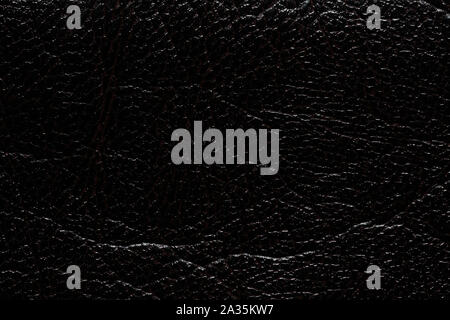 Strict black leatherette background. Superlative dark leatherette texture. Stock Photo