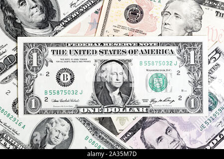 One dollar bill close-up on money background. Stock Photo
