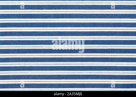 Purple and blue striped fabric texture with copy space. Stock Photo
