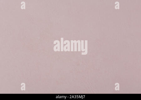 Light pink leather texture close up. Can be used as background in art or design projects. Stock Photo
