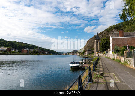Dinant, Namur / Belgium - 11 August 2019: view of the Saint Paul-des-Rivages church and the river Meuse in Dinant