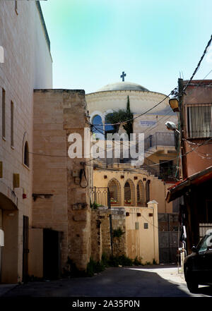 Nazareth, ISRAEL - 10 May 2019: Narrow street with colorful lanterns decorations in old town in Nazareth Stock Photo