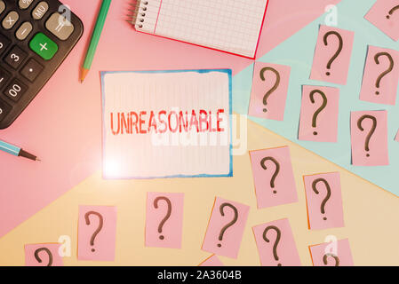 Writing note showing Unreasonable. Business concept for Beyond the limits of acceptability or fairness Inappropriate Mathematics stuff and writing equ Stock Photo