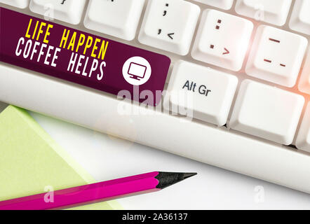 Writing note showing Life Happen Coffee Helps. Business concept for Have a hot drink when having problems troubles White pc keyboard with note paper a Stock Photo