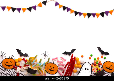 Happy Halloween concept with colored holiday candies on white Stock Photo