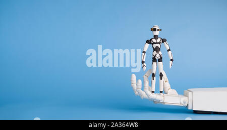 Big IT specialist robot holding small robotic cyborg Stock Photo