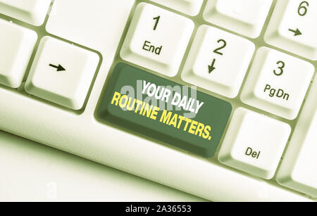 Handwriting text Your Daily Routine Matters. Conceptual photo Have good habits to live a healthy life White pc keyboard with empty note paper above wh Stock Photo