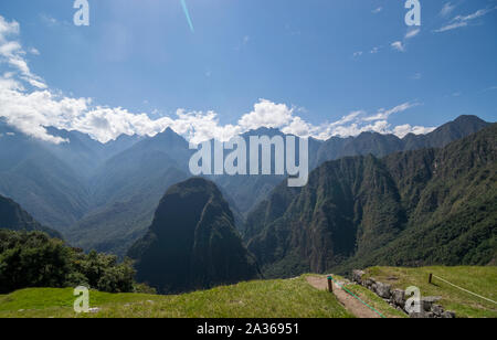 Machu Picchu, Peru - 05/21/2019:  Inca site of Machu Picchu and the surrounding Andes mountains in Peru. Stock Photo