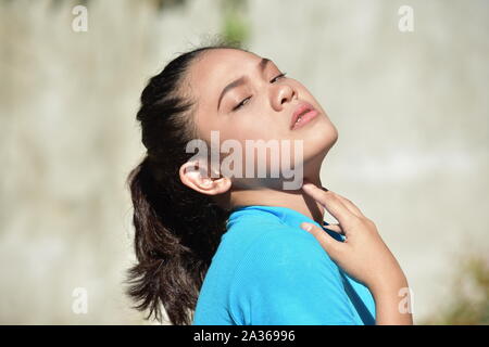 A Minority Female With Sore Throat Stock Photo