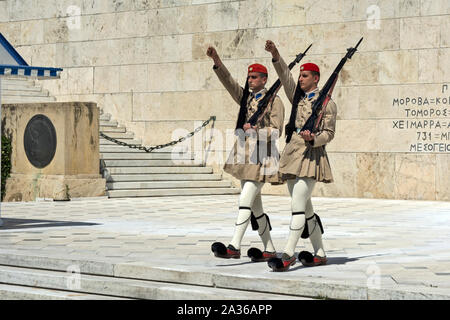 ATHENS, GREECE - JUNE 04: 2016. Evzones (presidential guards) watches over the monument of the Unknown Soldier in front of the Greek Parliament Buildi Stock Photo