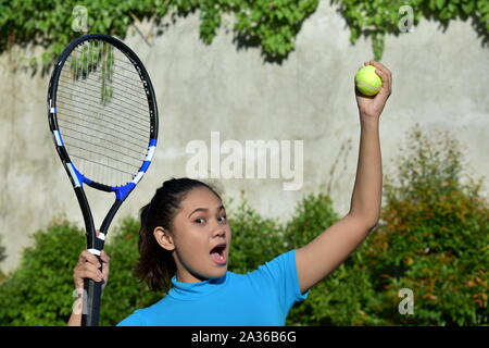 Female Tennis Player And Happiness With Tennis Racket Stock Photo