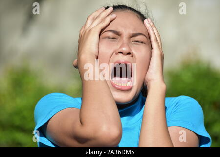 A Young Female Under Stress Stock Photo