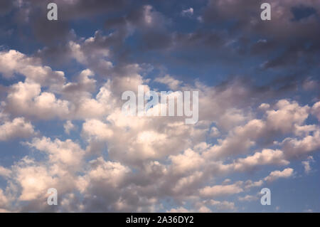 Beginning of the formation of a storm in the blue sky on a summer afternoon Stock Photo