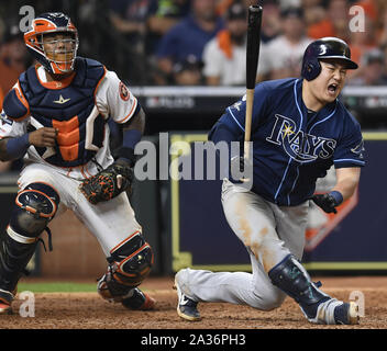 Houston, United States. 06th Oct, 2019. Tampa Bay Rays Ji-Man Choi (R) reacts after fouling a ball off his leg in the ninth inning against the Houston Astros during the American League Division Game two at Minute Maid Park in Houston, Texas on October 5, 2019. Houston leads the best of five series over Tampa Bay 1-0. Photo by Trask Smith/UPI Credit: UPI/Alamy Live News Stock Photo