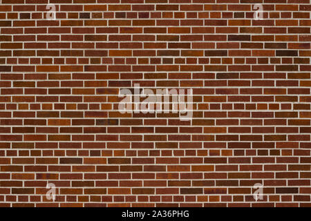 Vintage dark red clay brick wall texture background with common bond brickwork pattern Stock Photo