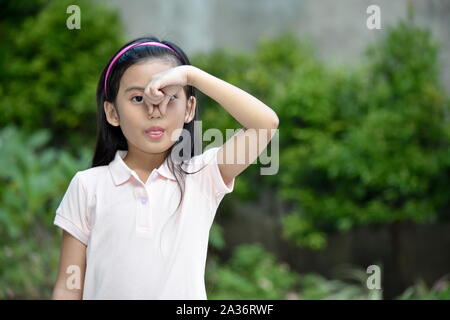 A Stinky Pretty Diverse Girl Youth Stock Photo