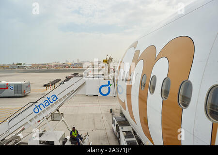 DUBAI, UAE - CIRCA JUNE, 2015: Boeing 777 operated by Emirates Airlines at Dubai International Airport. Stock Photo