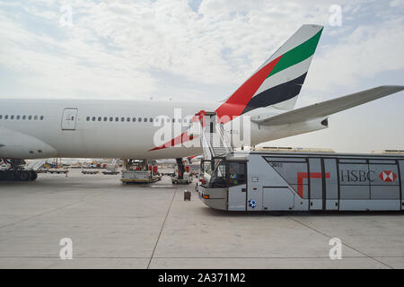 DUBAI, UAE - CIRCA JUNE, 2015: Boeing 777 operated by Emirates Airlines at Dubai International Airport. Stock Photo