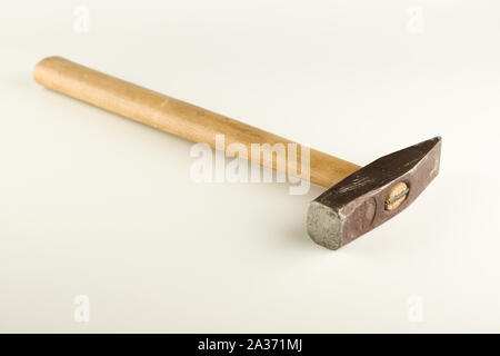Small hammer with wooden handle isolated on a white background Stock Photo