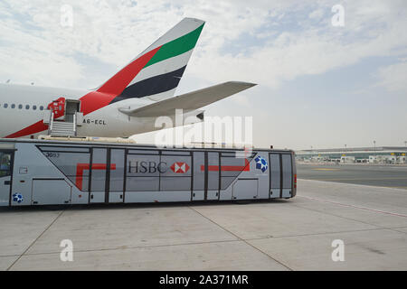 DUBAI, UAE - CIRCA JUNE, 2015: Boeing 777 operated by Emirates Airlines at Dubai International Airport. Stock Photo